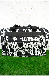 Black cow print duffle bag