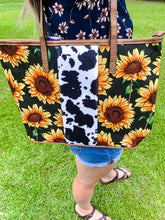 Load image into Gallery viewer, Cows on a sunny sunflower day tote
